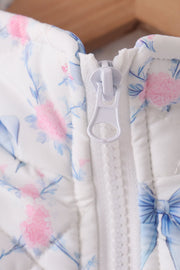 Sky floral bow ruffle vest