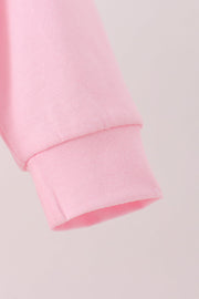 Pink football bow sequin bubble